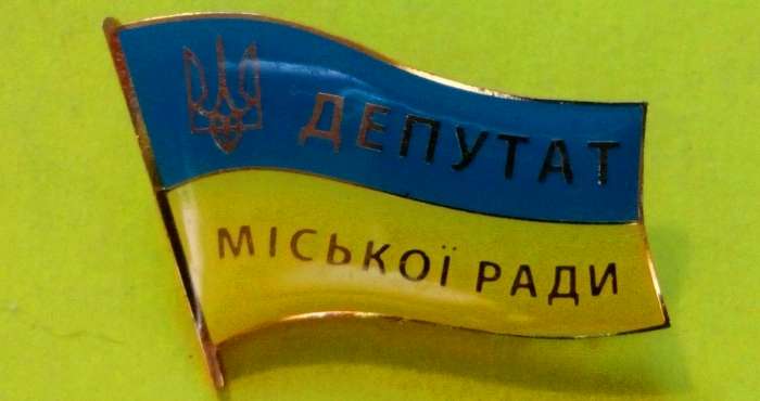 новини